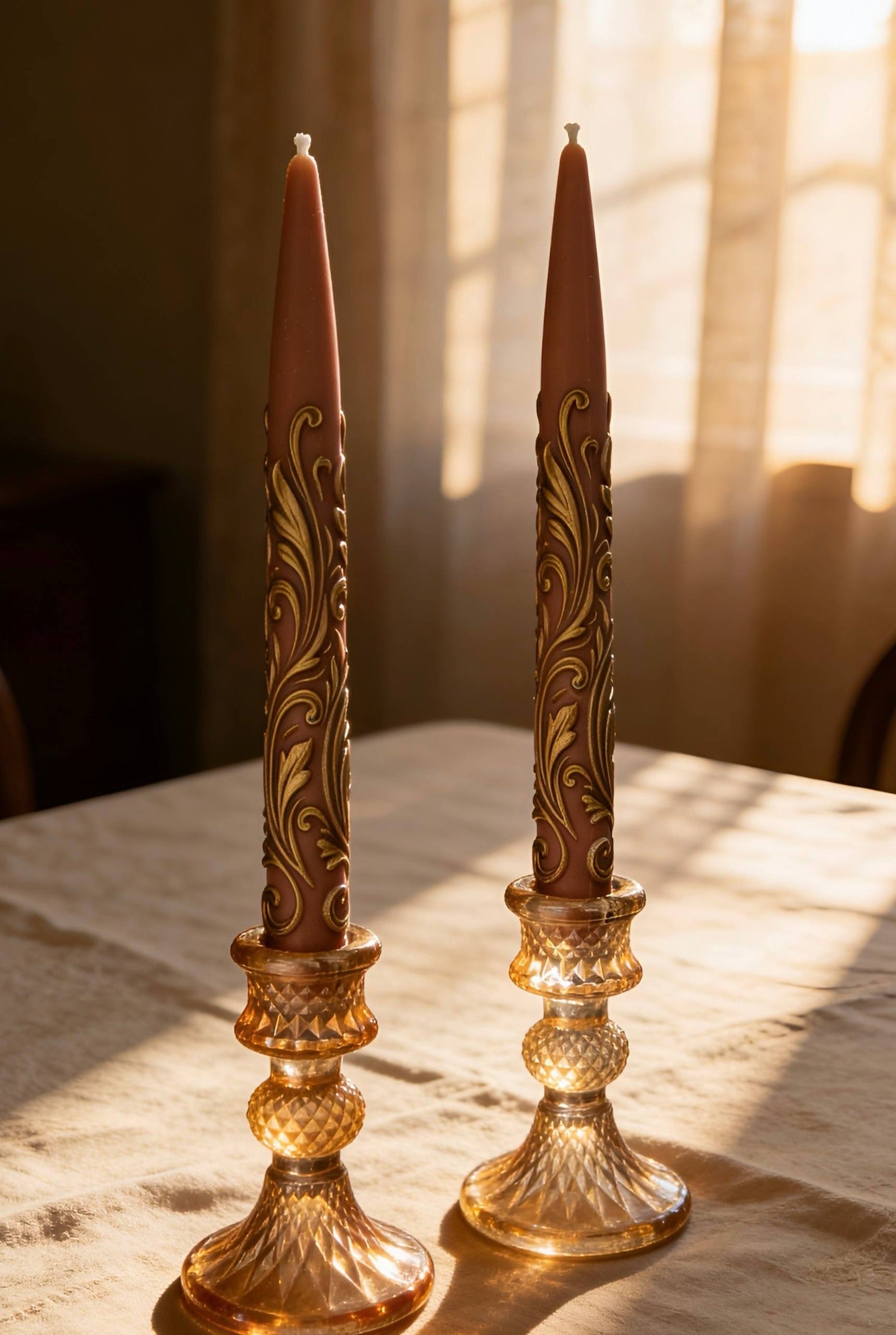 Sunlit taper candles made from Muse Molds silicone candle molds