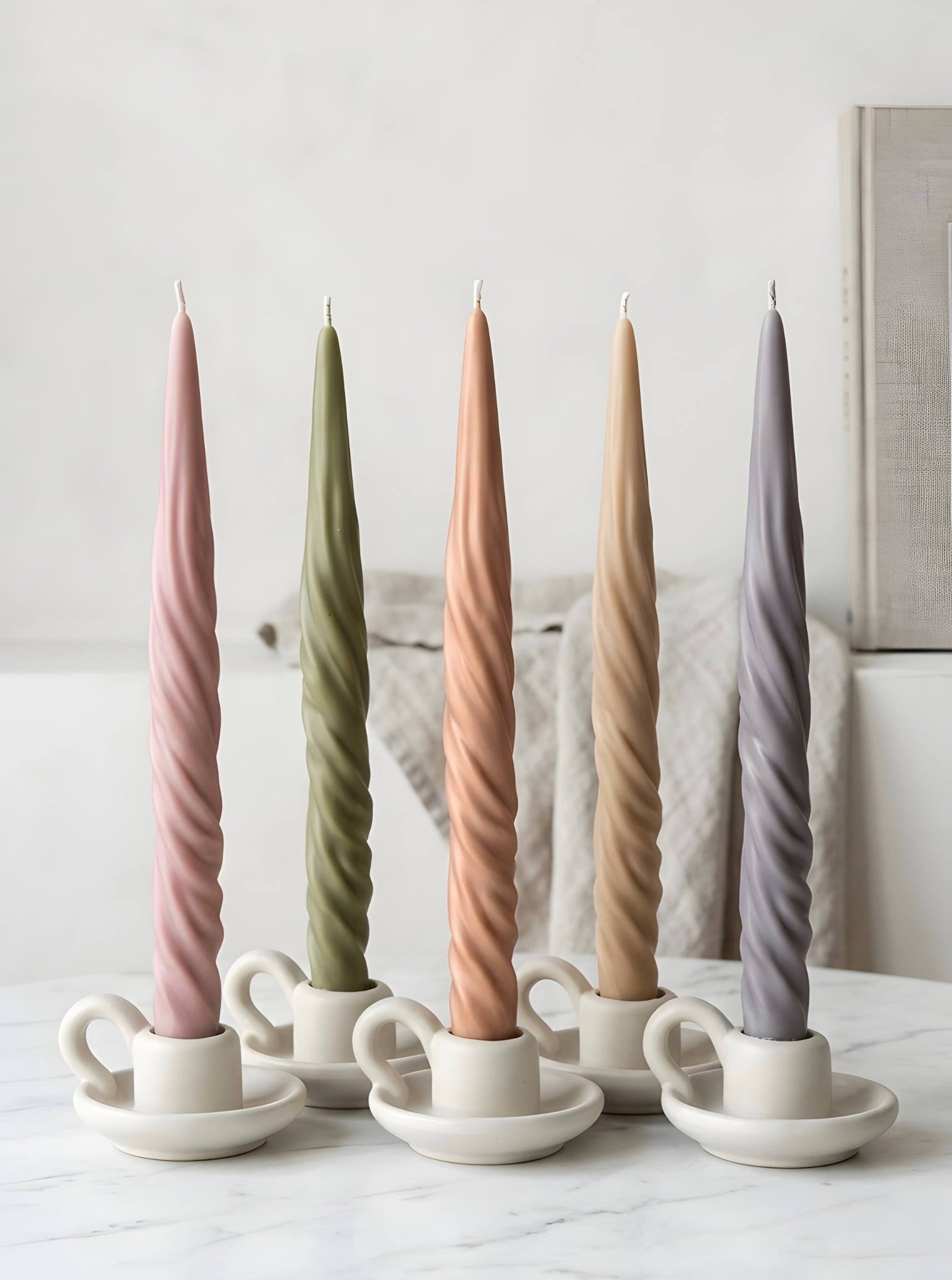 Twist taper candles made from Muse Molds silicone candle molds