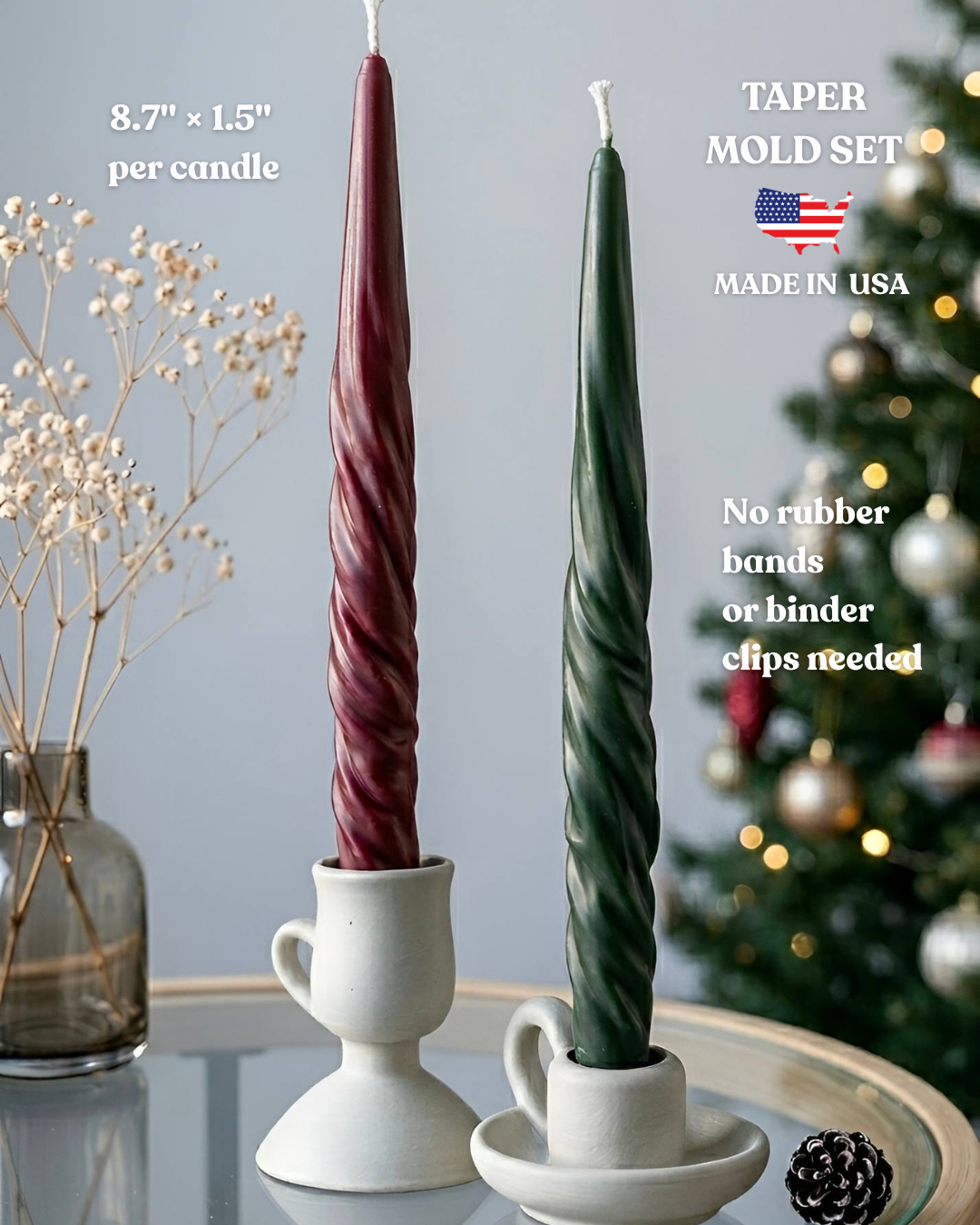 Burgundy and dark green spiral taper candles made with USA silicone mold burning in white ceramic holders on glass table with Christmas tree in background