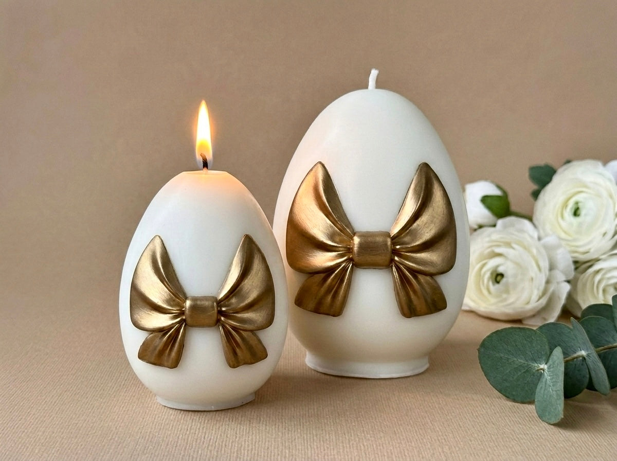 Bow egg candles made from Muse Molds silicone candle molds